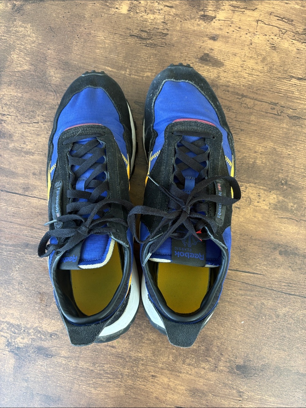 Reebok Men’s Blue and Black Runner with Yellow Accents